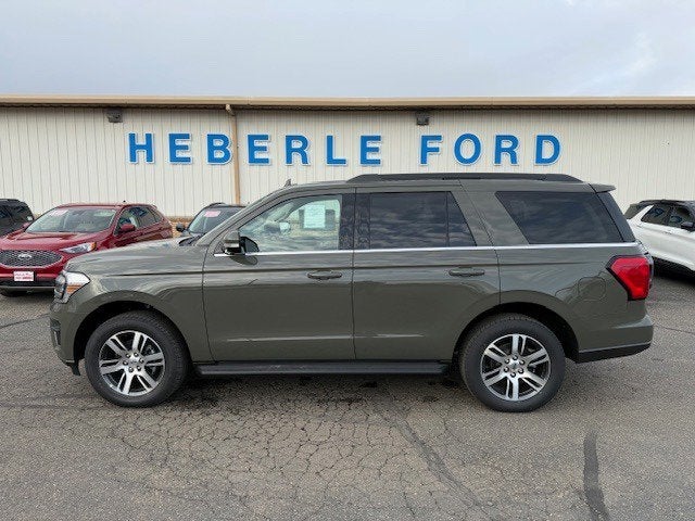 2024 Ford Expedition XLT in Wild Green — front three-quarter view