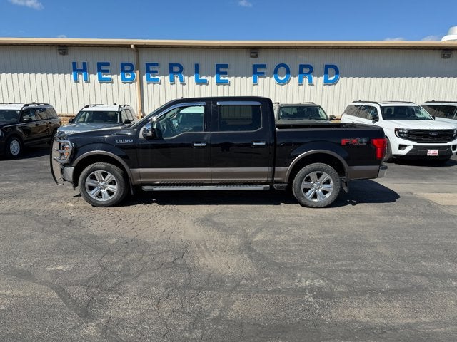 2019 Ford F-150 LARIAT in Black — front three-quarter view
